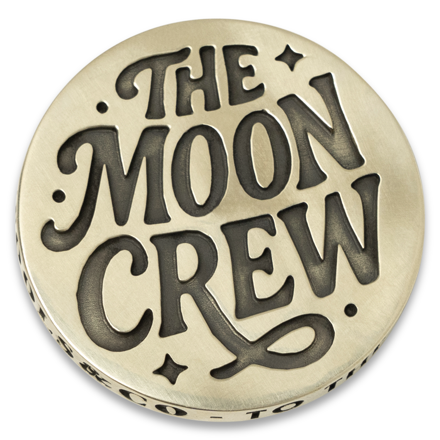 'The Moon Crew' engraved on a brass coin for Knafs Moon Crew Members, white background