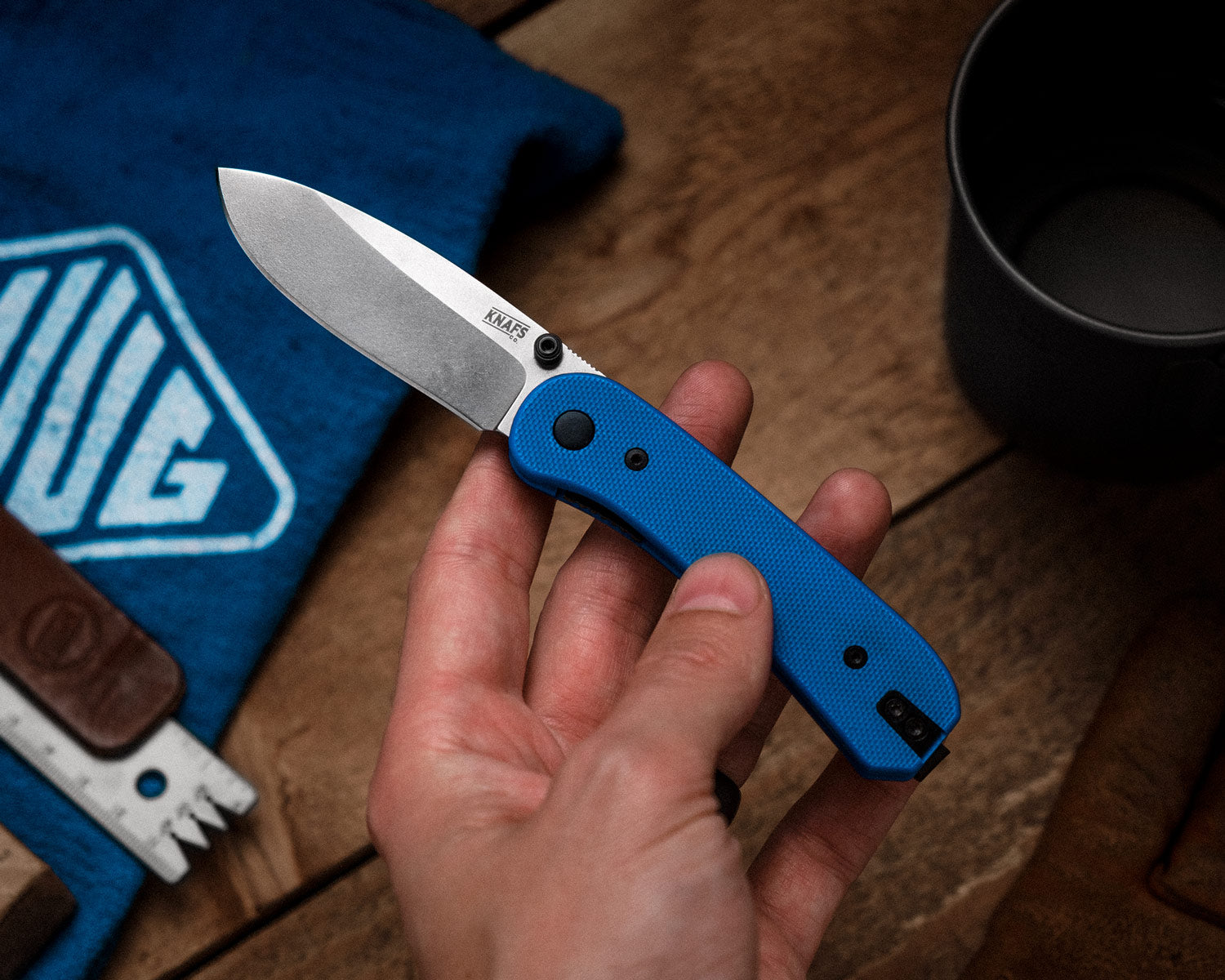 Lander 1 Pocket Knife - Blue G10 - D2 - Open Front in hand