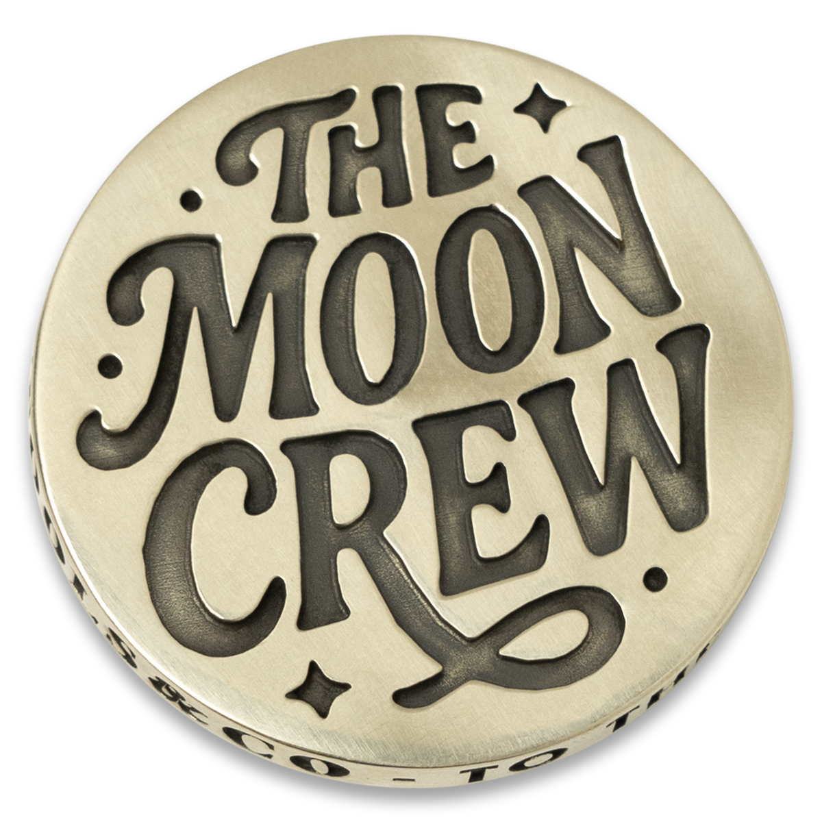 'The Moon Crew' engraved on a brass coin for Knafs Moon Crew Members, white background
