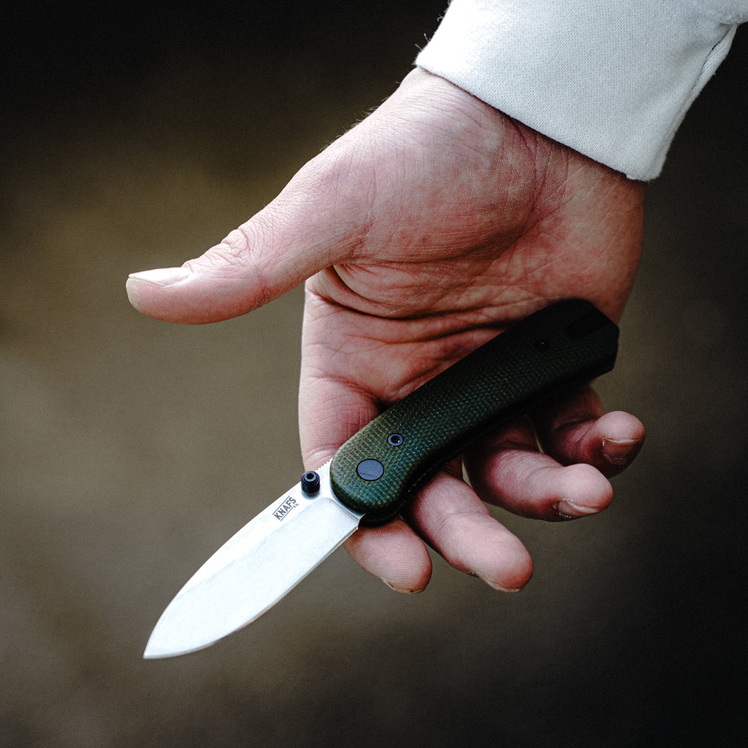 Lander 1 Pocket Knife - Contoured Green Micarta - 14C28N - Front Open on hands view